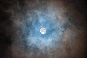 Blue-Brown Clouds and the Moon